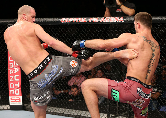 NOTTINGHAM, ENGLAND - SEPTEMBER 29: (L-R) Strefan Struve kicks Stipe Miocic during their heavyweight fight at the UFC on Fuel TV event at Capital FM Arena on September 29, 2012 in Nottingham, England. (Photo by Josh Hedges/Zuffa LLC/Zuffa LLC via Getty Images)