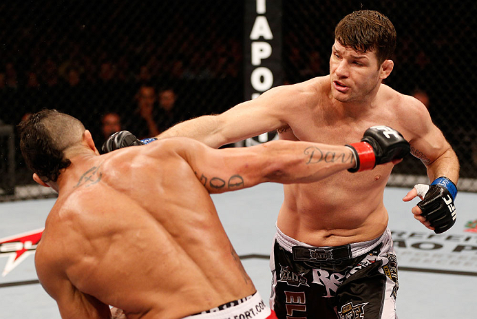 SAO PAULO, BRAZIL - JANUARY 19: (R-L) Michael Bisping punches Vitor Belfort in their middleweight fight at the UFC on FX event on January 19, 2013 at Ibirapuera Gymnasium in Sao Paulo, Brazil. (Photo by Josh Hedges/Zuffa LLC/Zuffa LLC via Getty Images)