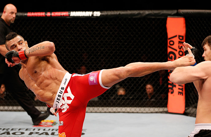 SAO PAULO, BRAZIL - JANUARY 19: (L-R) Vitor Belfort kicks Michael Bisping in their middleweight fight at the UFC on FX event on January 19, 2013 at Ibirapuera Gymnasium in Sao Paulo, Brazil. (Photo by Josh Hedges/Zuffa LLC/Zuffa LLC via Getty Images)