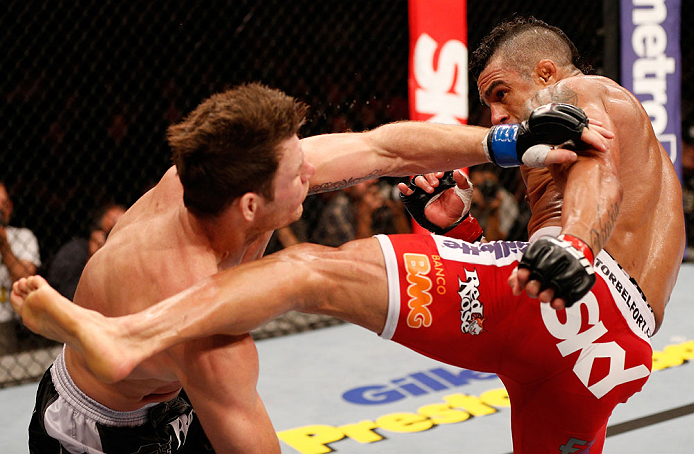 SAO PAULO, BRAZIL - JANUARY 19: (R-L) Vitor Belfort kicks Michael Bisping in their middleweight fight at the UFC on FX event on January 19, 2013 at Ibirapuera Gymnasium in Sao Paulo, Brazil. (Photo by Josh Hedges/Zuffa LLC/Zuffa LLC via Getty Images)