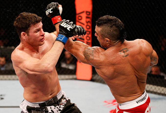 SAO PAULO, BRAZIL - JANUARY 19: (R-L) Vitor Belfort punches Michael Bisping in their middleweight fight at the UFC on FX event on January 19, 2013 at Ibirapuera Gymnasium in Sao Paulo, Brazil. (Photo by Josh Hedges/Zuffa LLC/Zuffa LLC via Getty Images)