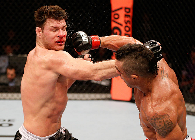 SAO PAULO, BRAZIL - JANUARY 19: (R-L) Vitor Belfort punches Michael Bisping in their middleweight fight at the UFC on FX event on January 19, 2013 at Ibirapuera Gymnasium in Sao Paulo, Brazil. (Photo by Josh Hedges/Zuffa LLC/Zuffa LLC via Getty Images)