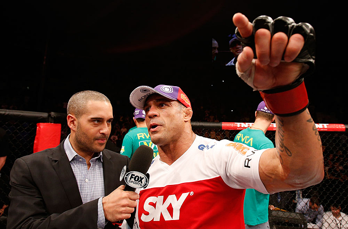SAO PAULO, BRAZIL - JANUARY 19: (R-L) Vitor Belfort is interviewed by Jon Anik after knocking out Michael Bisping in their middleweight fight at the UFC on FX event on January 19, 2013 at Ibirapuera Gymnasium in Sao Paulo, Brazil. (Photo by Josh Hedges/Zuffa LLC/Zuffa LLC via Getty Images)