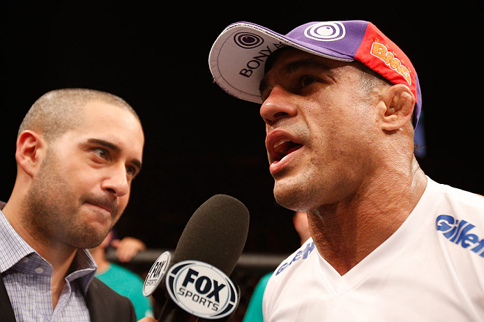 SAO PAULO, BRAZIL - JANUARY 19: (R-L) Vitor Belfort is interviewed by Jon Anik after knocking out Michael Bisping in their middleweight fight at the UFC on FX event on January 19, 2013 at Ibirapuera Gymnasium in Sao Paulo, Brazil. (Photo by Josh Hedges/Zuffa LLC/Zuffa LLC via Getty Images)