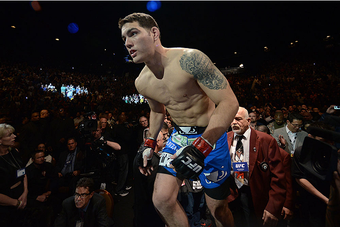 LAS VEGAS, NV - DECEMBER 28:  Chris Weidman enters the Octagon to face Anderson Silva in their UFC middleweight championship bout during the UFC 168 event at the MGM Grand Garden Arena on December 28, 2013 in Las Vegas, Nevada. (Photo by Donald Miralle/Zuffa LLC/Zuffa LLC via Getty Images) *** Local Caption *** Chris Weidman