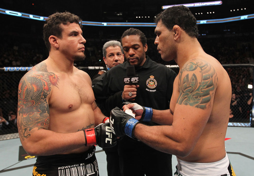 TORONTO, ON - DECEMBER 10:  (L-R) Heavyweight opponents Frank Mir and Antonio Rodrigo Nogueira receive final instructions from referee Herb Dean before their bout during the UFC 140 event at Air Canada Centre on December 10, 2011 in Toronto, Ontario, Canada.  (Photo by Nick Laham/Zuffa LLC/Zuffa LLC via Getty Images)