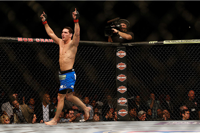 LAS VEGAS, NV - DECEMBER 28:  Chris Weidman reacts to his victory over Anderson Silva in their UFC middleweight championship bout during the UFC 168 event at the MGM Grand Garden Arena on December 28, 2013 in Las Vegas, Nevada. (Photo by Josh Hedges/Zuffa LLC/Zuffa LLC via Getty Images) *** Local Caption *** Chris Weidman