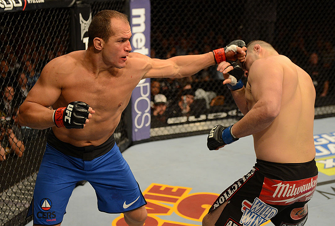 LAS VEGAS, NV - DECEMBER 29:  (L-R) Junior dos Santos punches Cain Velasquez during their heavyweight championship fight at UFC 155 on December 29, 2012 at MGM Grand Garden Arena in Las Vegas, Nevada. (Photo by Donald Miralle/Zuffa LLC/Zuffa LLC via Getty Images) *** Local Caption *** Junior dos Santos; Cain Velasquez