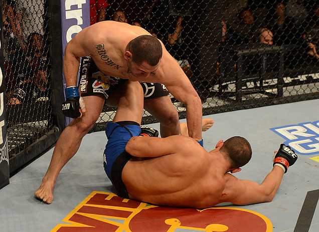 LAS VEGAS, NV - DECEMBER 29:  (L-R) Cain Velasquez punches Junior dos Santos during their heavyweight championship fight at UFC 155 on December 29, 2012 at MGM Grand Garden Arena in Las Vegas, Nevada. (Photo by Donald Miralle/Zuffa LLC/Zuffa LLC via Getty Images) *** Local Caption *** Junior dos Santos; Cain Velasquez