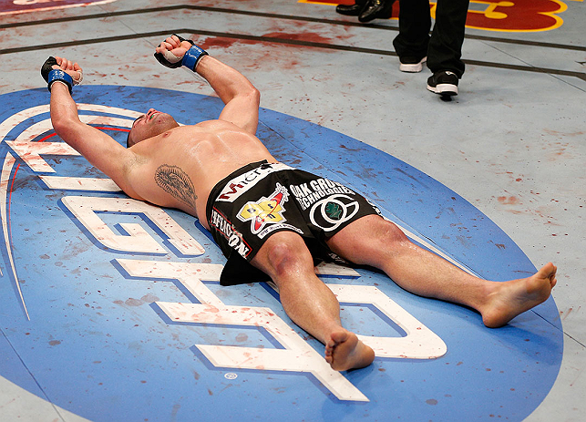 LAS VEGAS, NV - DECEMBER 29:  Cain Velasquez reacts to his victory over Junior dos Santos after their heavyweight championship fight at UFC 155 on December 29, 2012 at MGM Grand Garden Arena in Las Vegas, Nevada. (Photo by Josh Hedges/Zuffa LLC/Zuffa LLC via Getty Images) *** Local Caption *** Junior dos Santos; Cain Velasquez