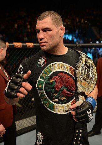 LAS VEGAS, NV - DECEMBER 29:  Cain Velasquez reacts to his victory after his heavyweight championship fight against Junior dos Santos at UFC 155 on December 29, 2012 at MGM Grand Garden Arena in Las Vegas, Nevada. (Photo by Donald Miralle/Zuffa LLC/Zuffa LLC via Getty Images) *** Local Caption *** Junior dos Santos; Cain Velasquez