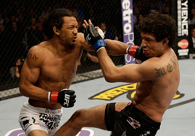 SAN JOSE, CA - APRIL 20:   (L-R) Benson Henderson punches Gilbert Melendez in their lightweight championship bout during the UFC on FOX event at the HP Pavilion on April 20, 2013 in San Jose, California.  (Photo by Ezra Shaw/Zuffa LLC/Zuffa LLC via Getty Images)  *** Local Caption *** Benson Henderson; Gilbert Melendez
