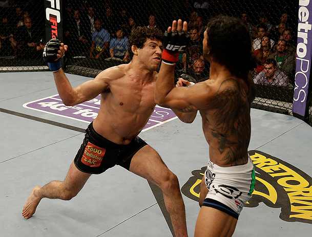 SAN JOSE, CA - APRIL 20:   (L-R) Gilbert Melendez punches Benson Henderson in their lightweight championship bout during the UFC on FOX event at the HP Pavilion on April 20, 2013 in San Jose, California.  (Photo by Ezra Shaw/Zuffa LLC/Zuffa LLC via Getty Images)  *** Local Caption *** Benson Henderson; Gilbert Melendez