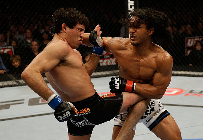 SAN JOSE, CA - APRIL 20:   (R-L) Benson Henderson punches Gilbert Melendez in their lightweight championship bout during the UFC on FOX event at the HP Pavilion on April 20, 2013 in San Jose, California.  (Photo by Ezra Shaw/Zuffa LLC/Zuffa LLC via Getty Images)  *** Local Caption *** Benson Henderson; Gilbert Melendez