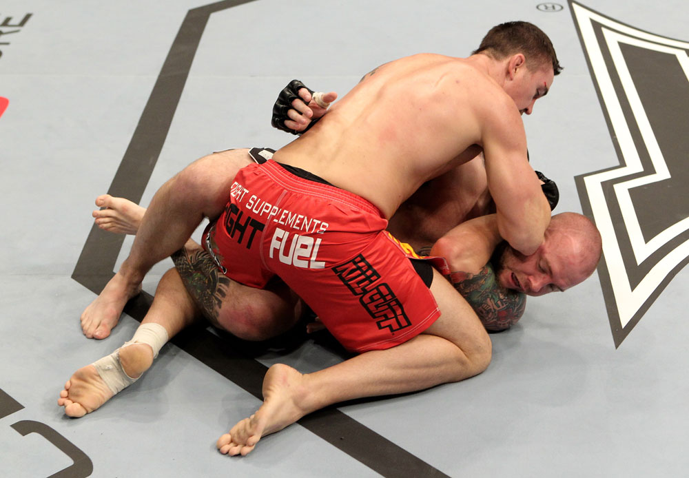 Kyle Noke (L) of Australia fights with Rob Kimmons of the USA during their UFC Middleweight bout at the Konig Pilsner Arena on November 13, 2010 in Oberhausen, Germany. (Photo by Josh Hedges/Zuffa LLC/Zuffa LLC)