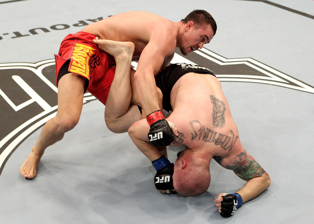 Kyle Noke (L) of Australia fights with Rob Kimmons of the USA during their UFC Middleweight bout at the Konig Pilsner Arena on November 13, 2010 in Oberhausen, Germany. (Photo by Josh Hedges/Zuffa LLC/Zuffa LLC)