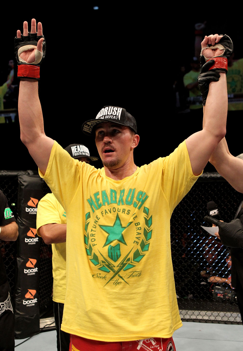 Kyle Noke of Australia celebrates victory by tap out in the 2nd round against Rob Kimmons of the USA during their UFC Middleweight bout at the Konig Pilsner Arena on November 13, 2010 in Oberhausen, Germany. (Photo by Josh Hedges/Zuffa LLC/Zuffa LLC)