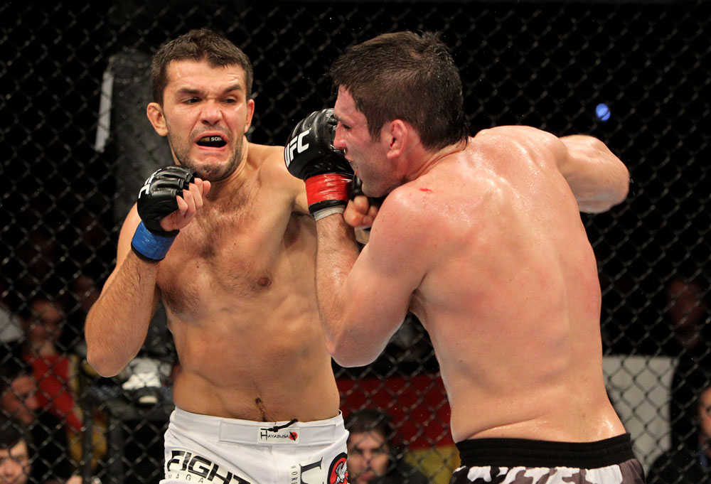 Amir Sadollah (R) of the USA fights Peter Sobatta of Germany during their UFC Welterweight bout at the Konig Pilsner Arena on November 13, 2010 in Oberhausen, Germany. (Photo by Josh Hedges/Zuffa LLC/Zuffa LLC)