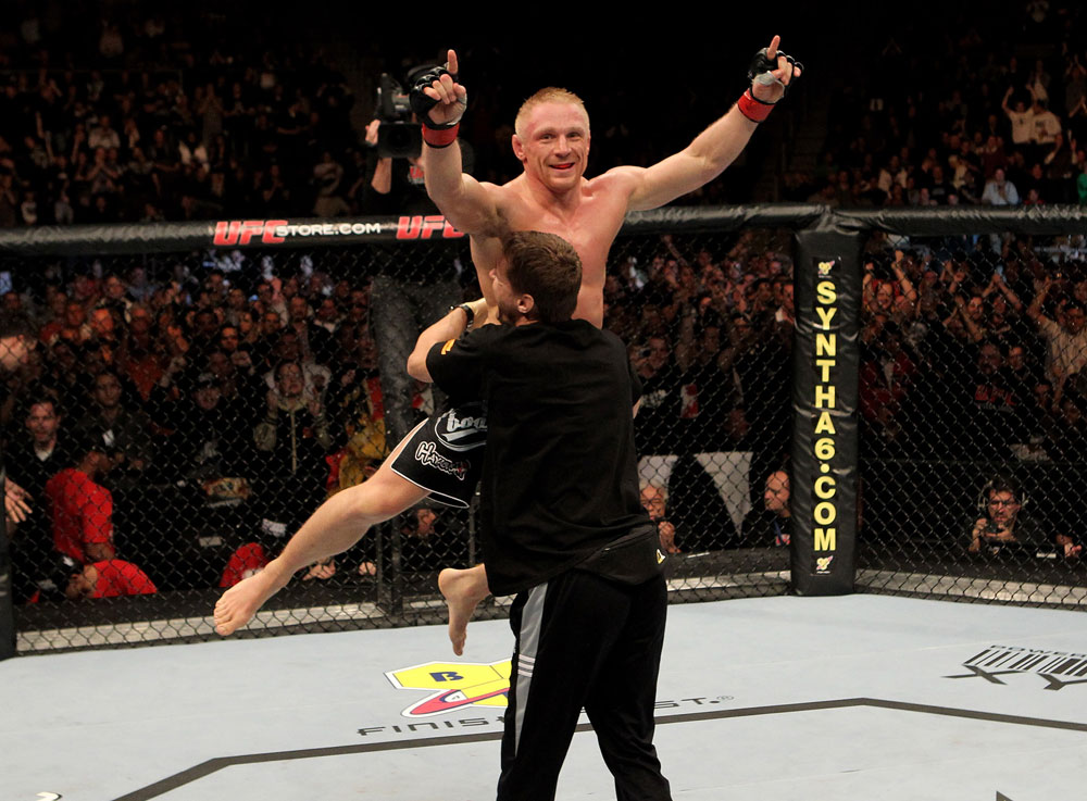 Dennis Siver of Germany celebrates his victory by tap out in the 1st round over Andre Winner of England during their UFC Lightweight bout at the Konig Pilsner Arena on November 13, 2010 in Oberhausen, Germany. (Photo by Josh Hedges/Zuffa LLC/Zuffa LLC)