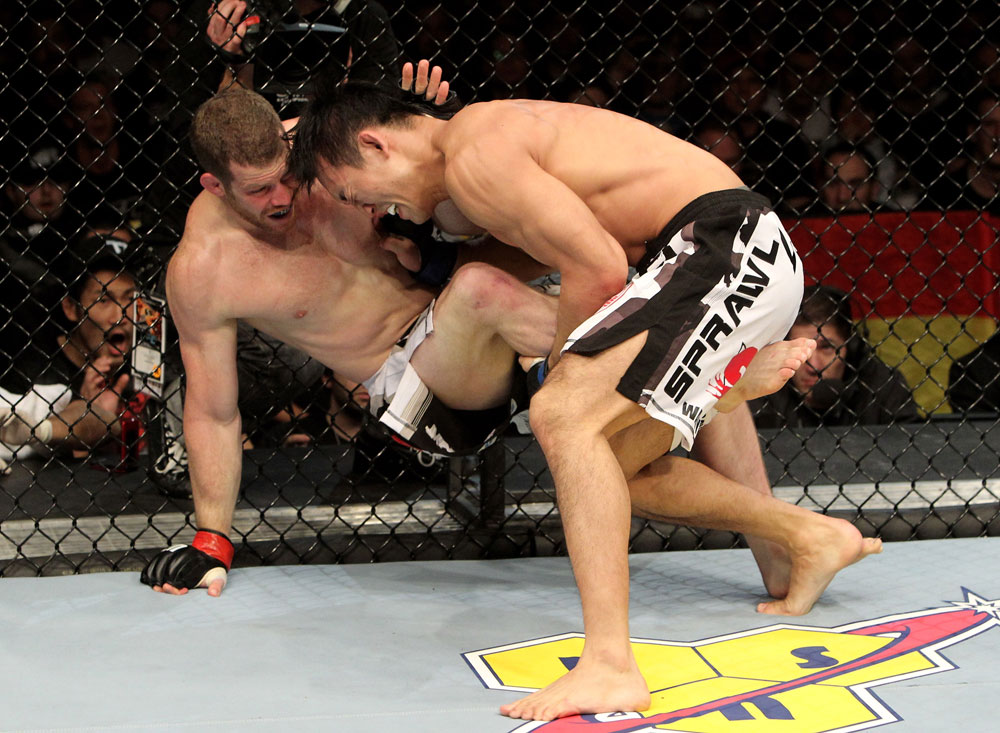 Nate Marquardt of the USA fights Yushin Okami (R) of Japan during their UFC Middleweight Championship Eliminator bout at the Konig Pilsner Arena on November 13, 2010 in Oberhausen, Germany. (Photo by Josh Hedges/Zuffa LLC/Zuffa LLC via Getty Images)