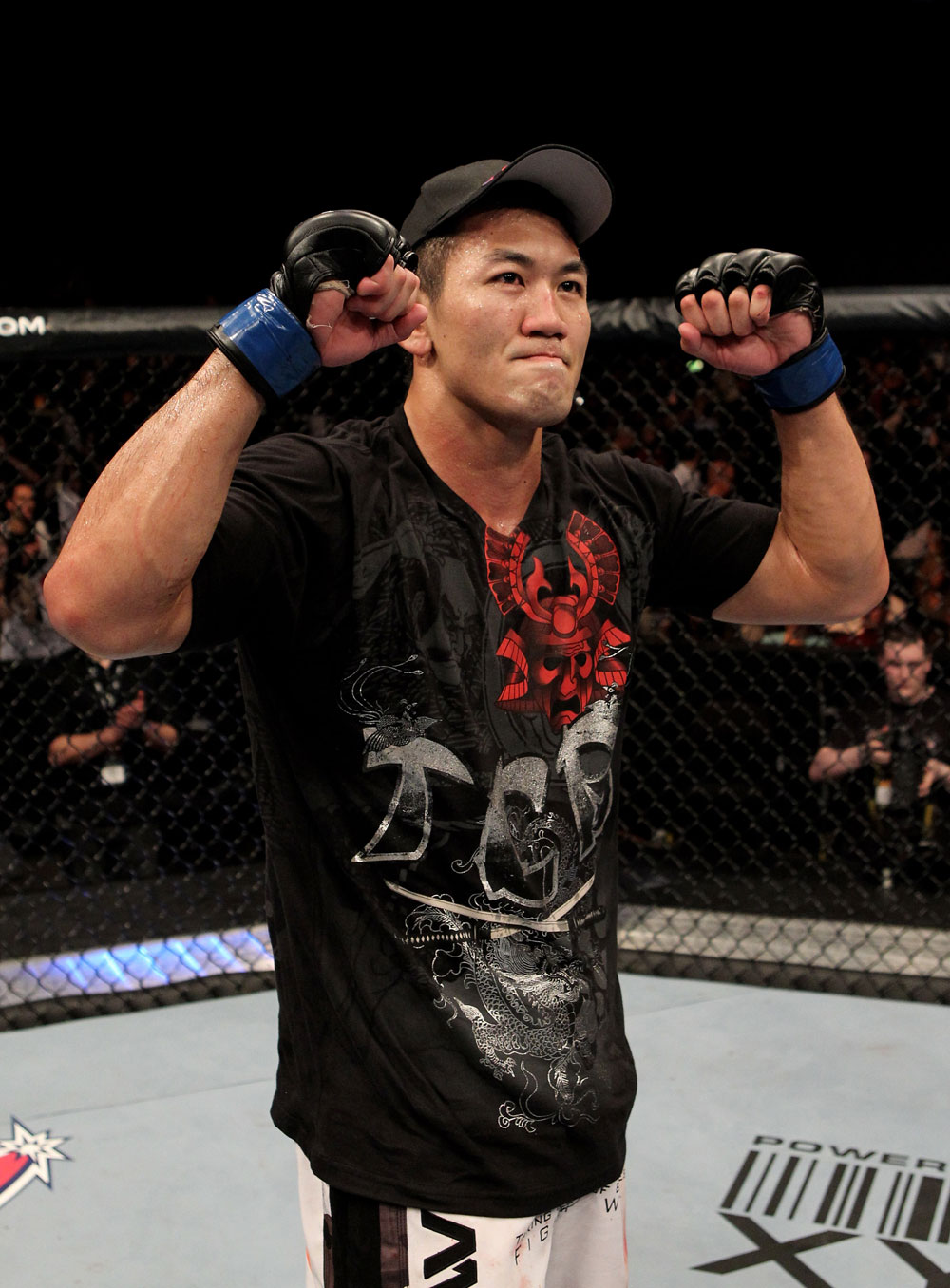 Yushin Okami of Japan celebrates his unanimous points victory over Nate Marquardt of the USA during their UFC Middleweight Championship Eliminator bout at the Konig Pilsner Arena on November 13, 2010 in Oberhausen, Germany. (Photo by Josh Hedges/Zuffa LLC/Zuffa LLC)