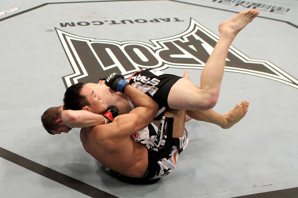 Nate Marquardt of the USA fights Yushin Okami (L) of Japan during their UFC Middleweight Championship Eliminator bout at the Konig Pilsner Arena on November 13, 2010 in Oberhausen, Germany. (Photo by Josh Hedges/Zuffa LLC/Zuffa LLC)
