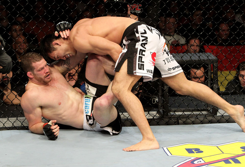 Nate Marquardt of the USA fights Yushin Okami (R) of Japan during their UFC Middleweight Championship Eliminator bout at the Konig Pilsner Arena on November 13, 2010 in Oberhausen, Germany. (Photo by Josh Hedges/Zuffa LLC/Zuffa LLC)