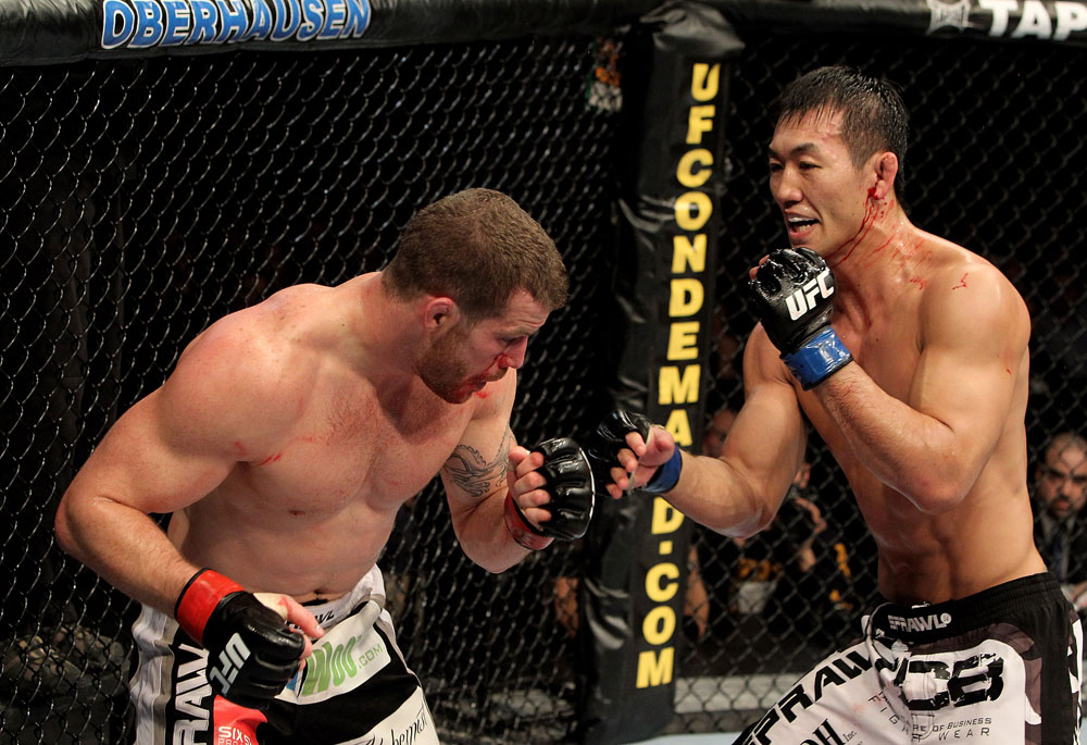 Nate Marquardt of the USA fights Yushin Okami (R) of Japan during their UFC Middleweight Championship Eliminator bout at the Konig Pilsner Arena on November 13, 2010 in Oberhausen, Germany. (Photo by Josh Hedges/Zuffa LLC/Zuffa LLC)