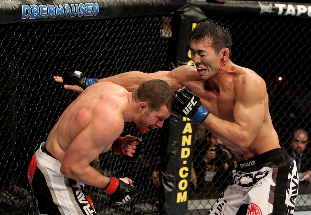 Nate Marquardt of the USA fights Yushin Okami (R) of Japan during their UFC Middleweight Championship Eliminator bout at the Konig Pilsner Arena on November 13, 2010 in Oberhausen, Germany. (Photo by Josh Hedges/Zuffa LLC/Zuffa LLC)