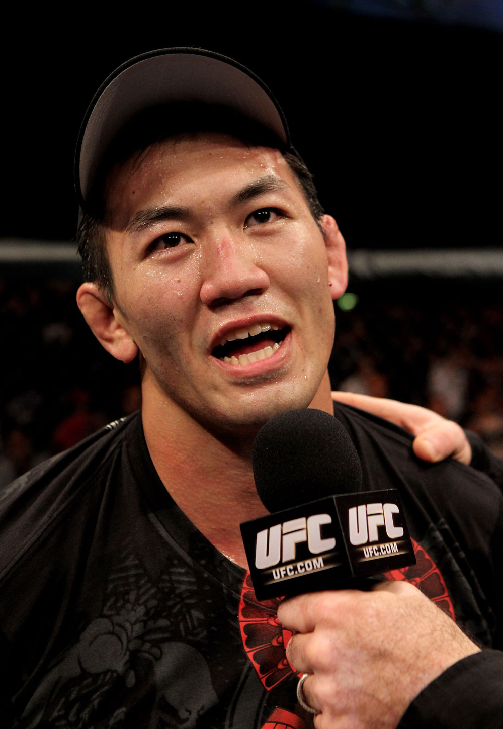 Yushin Okami of Japan is interviewd after his unanimous points victory over Nate Marquardt of the USA during their UFC Middleweight Championship Eliminator bout at the Konig Pilsner Arena on November 13, 2010 in Oberhausen, Germany. (Photo by Josh Hedges/Zuffa LLC/Zuffa LLC)