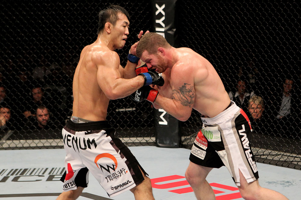 Nate Marquardt of the USA fights Yushin Okami (L) of Japan during their UFC Middleweight Championship Eliminator bout at the Konig Pilsner Arena on November 13, 2010 in Oberhausen, Germany. (Photo by Josh Hedges/Zuffa LLC/Zuffa LLC)