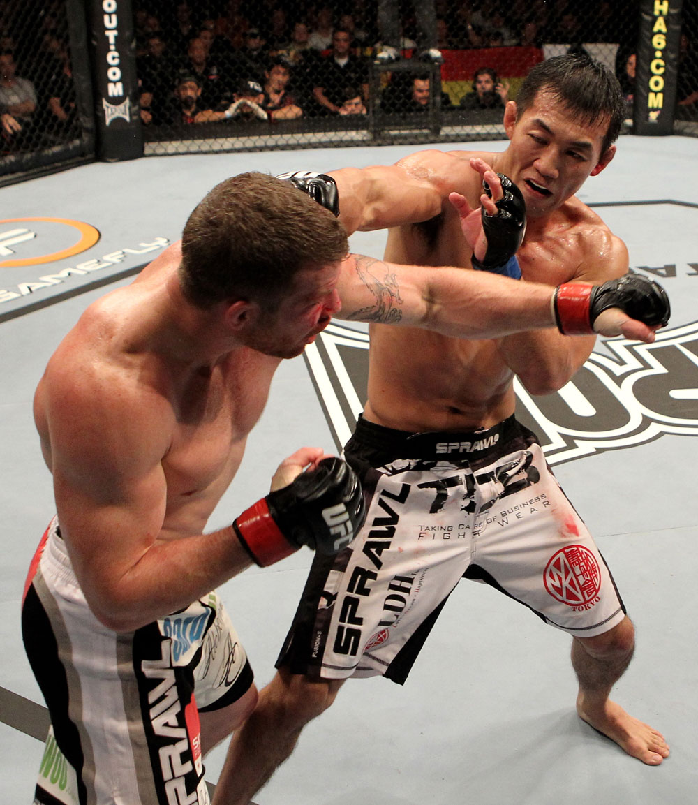 Nate Marquardt of the USA fights Yushin Okami (R) of Japan during their UFC Middleweight Championship Eliminator bout at the Konig Pilsner Arena on November 13, 2010 in Oberhausen, Germany. (Photo by Josh Hedges/Zuffa LLC/Zuffa LLC)