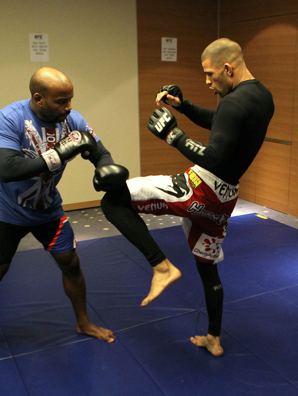Andre Winner (R) works out with trainer Dean Amasinger at the UFC 122 open workouts at the Hilton Hotel on November 10, 2010 in Dusseldorf, Germany. (Photo by Josh Hedges/Zuffa LLC via Getty Images)