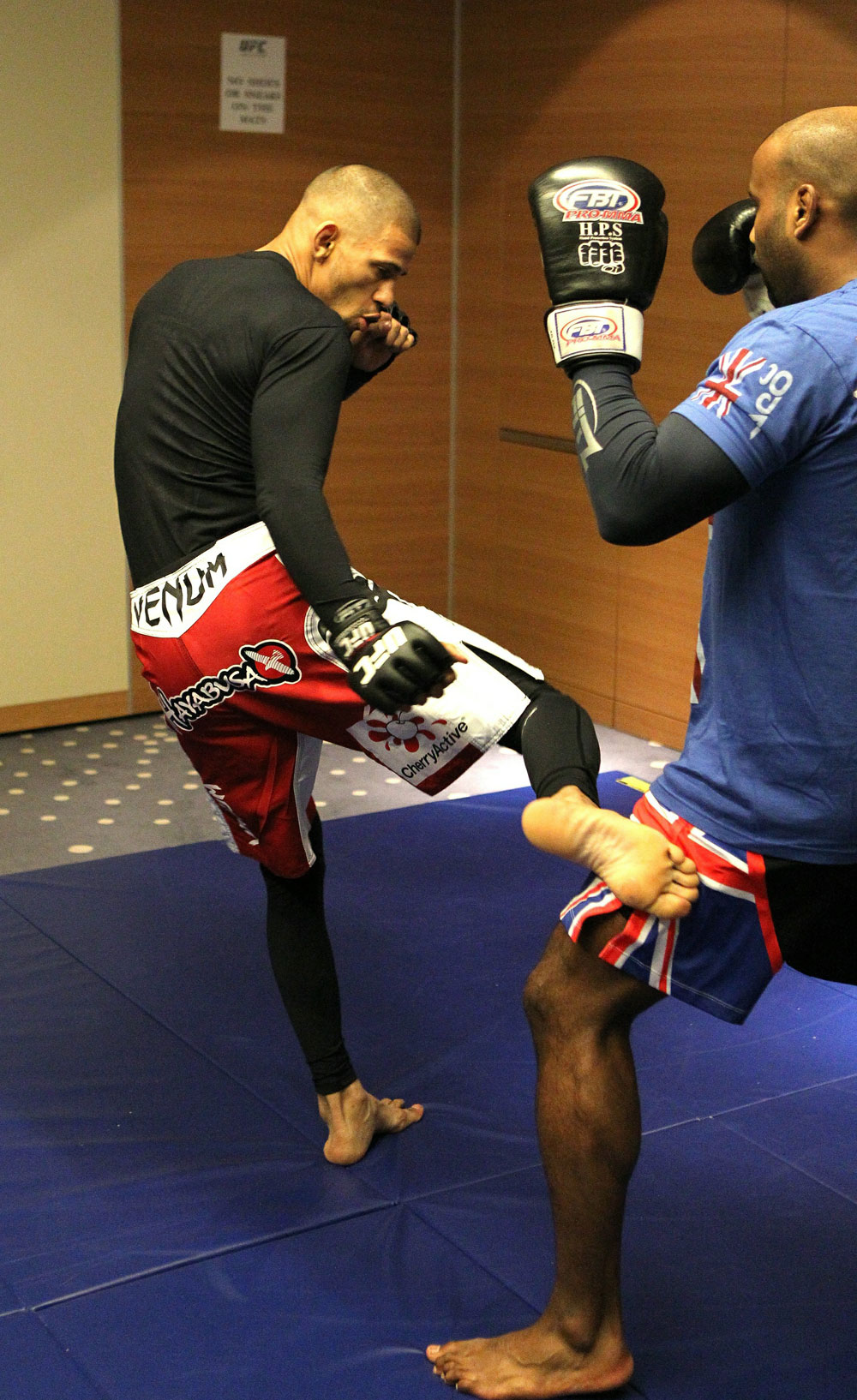 Andre Winner works out with trainer Dean Amasinger at the UFC 122 open workouts at the Hilton Hotel on November 10, 2010 in Dusseldorf, Germany. (Photo by Josh Hedges/Zuffa LLC via Getty Images)