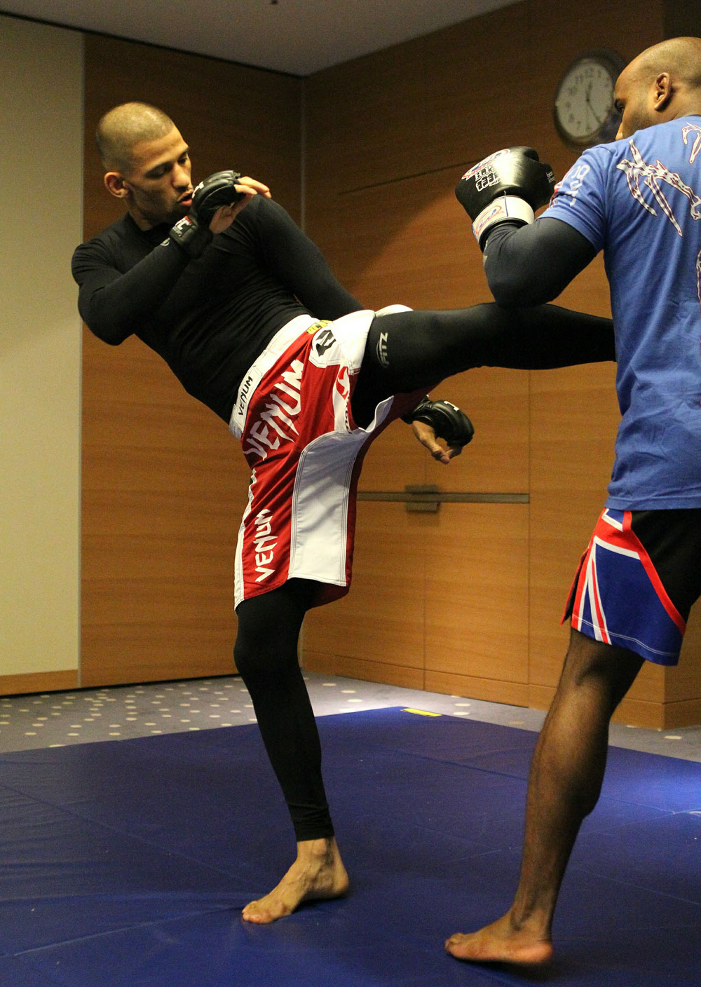 Andre Winner (L) works out with trainer Dean Amasinger at the UFC 122 open workouts at the Hilton Hotel on November 10, 2010 in Dusseldorf, Germany. (Photo by Josh Hedges/Zuffa LLC via Getty Images)