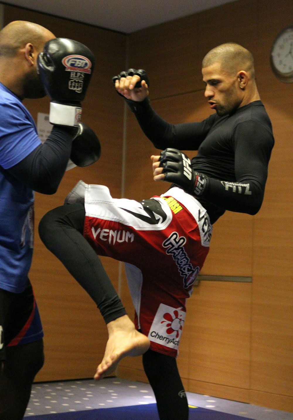 Andre Winner (R) works out with trainer Dean Amasinger at the UFC 122 open workouts at the Hilton Hotel on November 10, 2010 in Dusseldorf, Germany. (Photo by Josh Hedges/Zuffa LLC via Getty Images)
