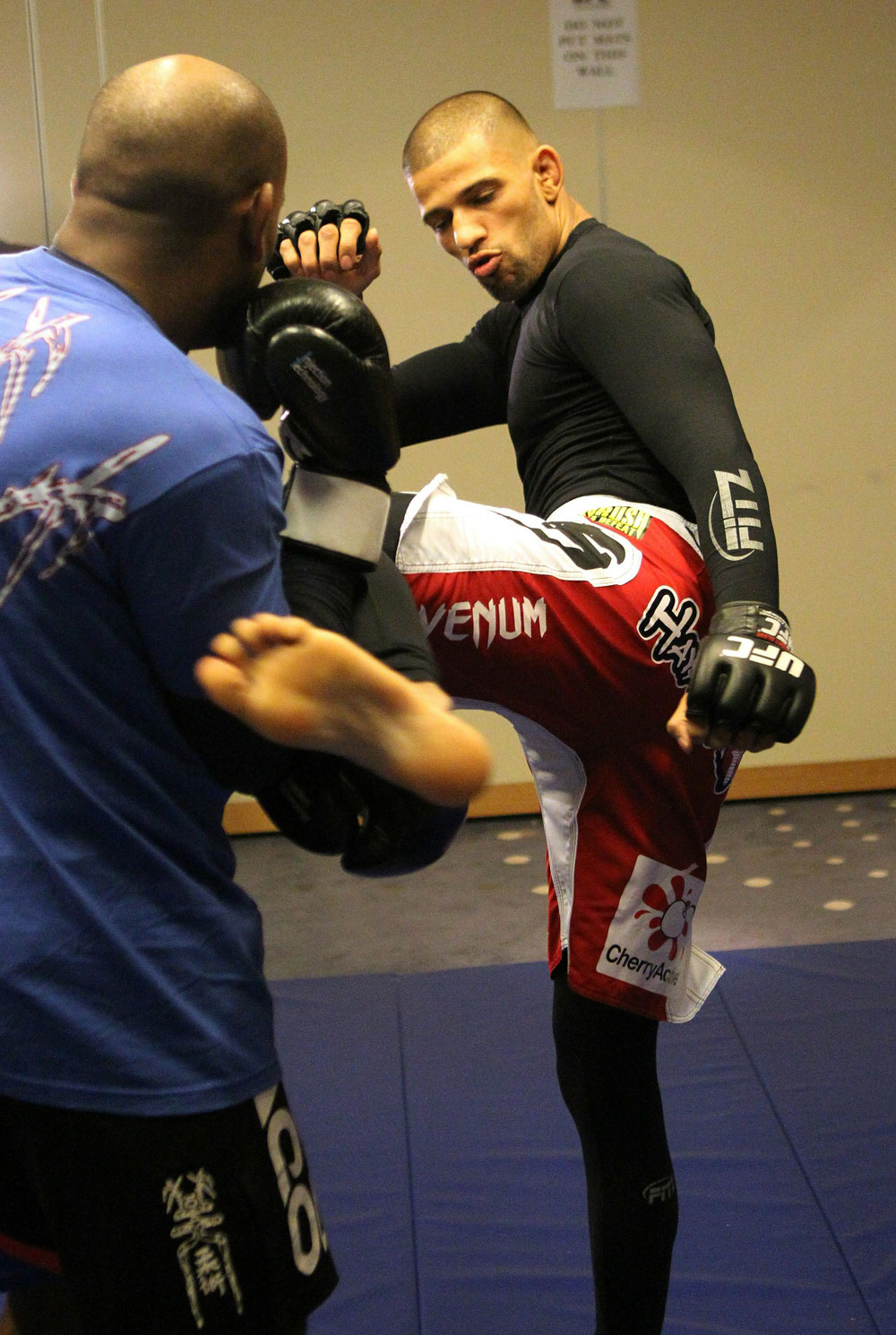 (R-L) Andre Winner works out with trainer Dean Amasinger at the UFC 122 open workouts at the Hilton Hotel on November 10, 2010 in Dusseldorf, Germany. (Photo by Josh Hedges/Zuffa LLC via Getty Images)