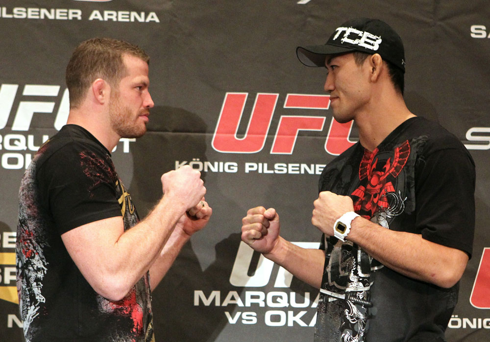 (L-R) Middleweight opponents Nate Marquardt and Yushin Okami face off at the UFC 122 pre-fight press conference at the Hilton Hotel on November 11, 2010 in Dusseldorf, Germany. (Photo by Josh Hedges/Zuffa LLC/Zuffa LLC via Getty Images)