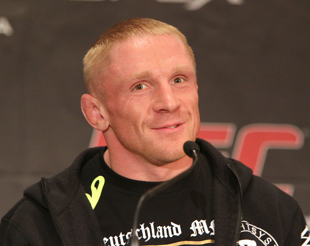Dennis Siver of Germany speaks at the UFC 122 pre-fight press conference at the Hilton Hotel on November 11, 2010 in Dusseldorf, Germany. (Photo by Josh Hedges/Zuffa LLC/Zuffa LLC via Getty Images)