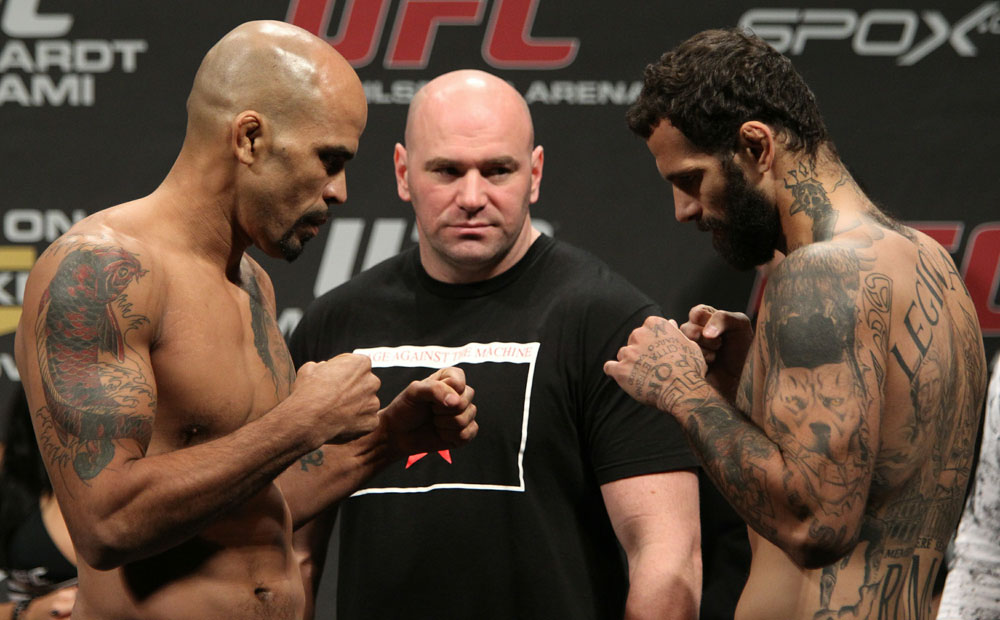 Middleweight opponents Jorge Rivera (L) of United States  and Alessio Sakara (R) of Italy face off as UFC President Dana White looks on at the UFC 122 weigh-in at the Koenig Pilsener Arena on November 12,  2010 in Oberhausen, Germany.  (Photo by Josh Hedges/Zuffa LLC/Zuffa L