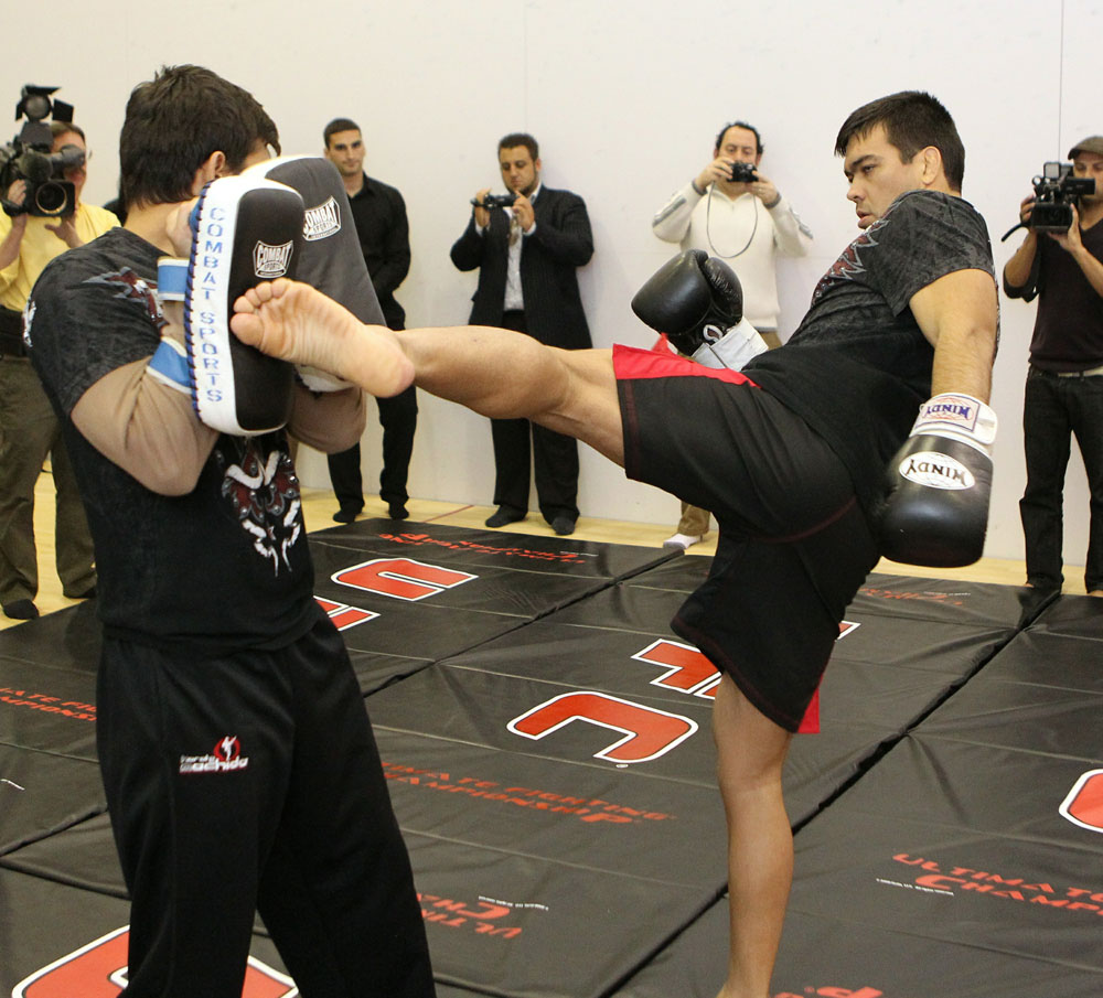 Lyoto Machida (R) works out for the media at the UFC 123 open workouts at the Detroit Athletic Club in Detroit, Michigan on November 18, 2010 (Photo by Josh Hedges/Zuffa LLC/Zuffa LLC via Getty Images)