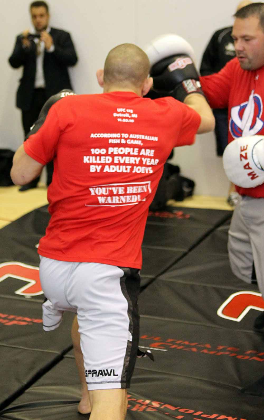 Joe Lauzon (L) works out for the media at the UFC 123 open workouts at the Detroit Athletic Club on November 18, 2010 in Detroit, Michigan. (Photo by Josh Hedges/Zuffa LLC/Zuffa LLC via Getty Images)