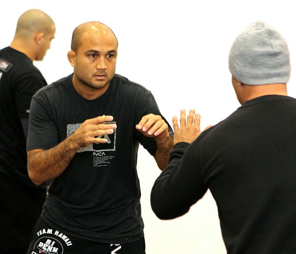 BJ Penn (L) works out for the media at the UFC 123 open workouts at the Detroit Athletic Club on November 18, 2010 in Detroit, Michigan.  (Photo by Josh Hedges/Zuffa LLC/Zuffa LLC via Getty Images)