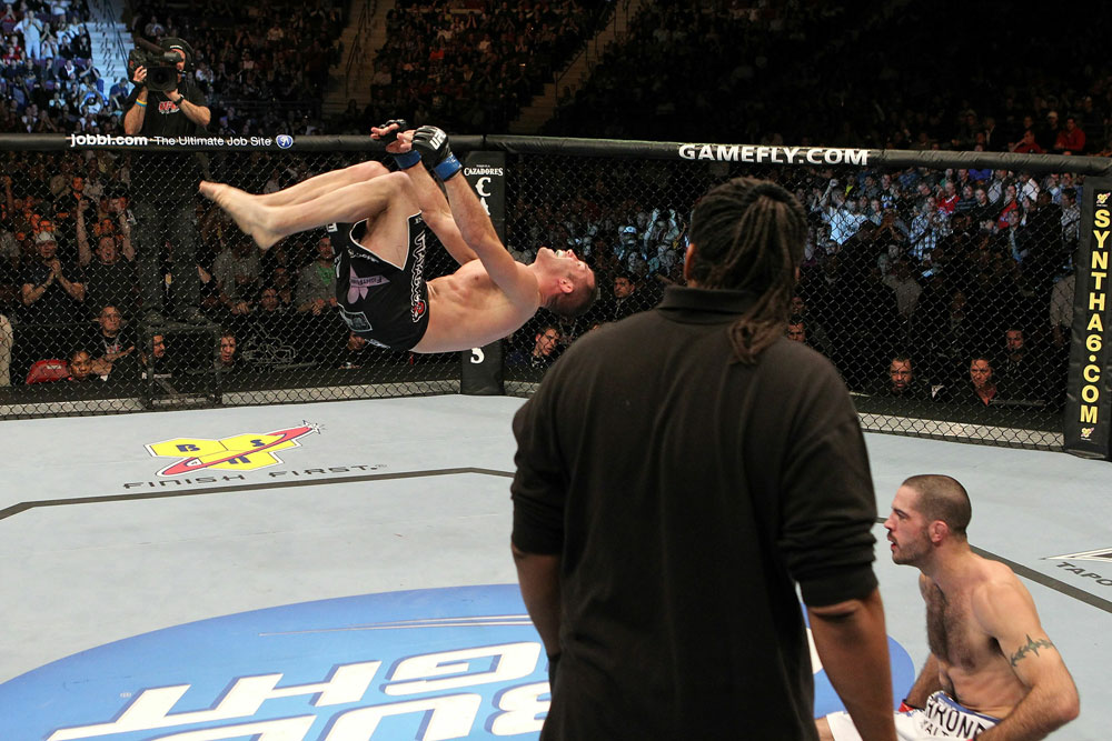 UFC 123: Brian Foster celebrates with a backflip.