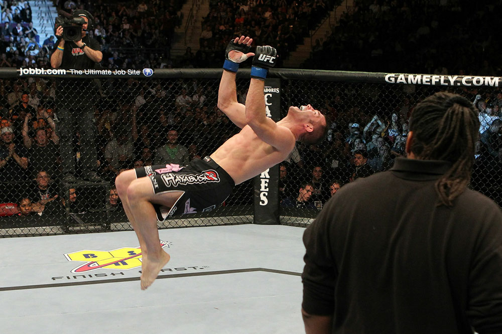 UFC 123: Brian Foster celebrates with a backflip.