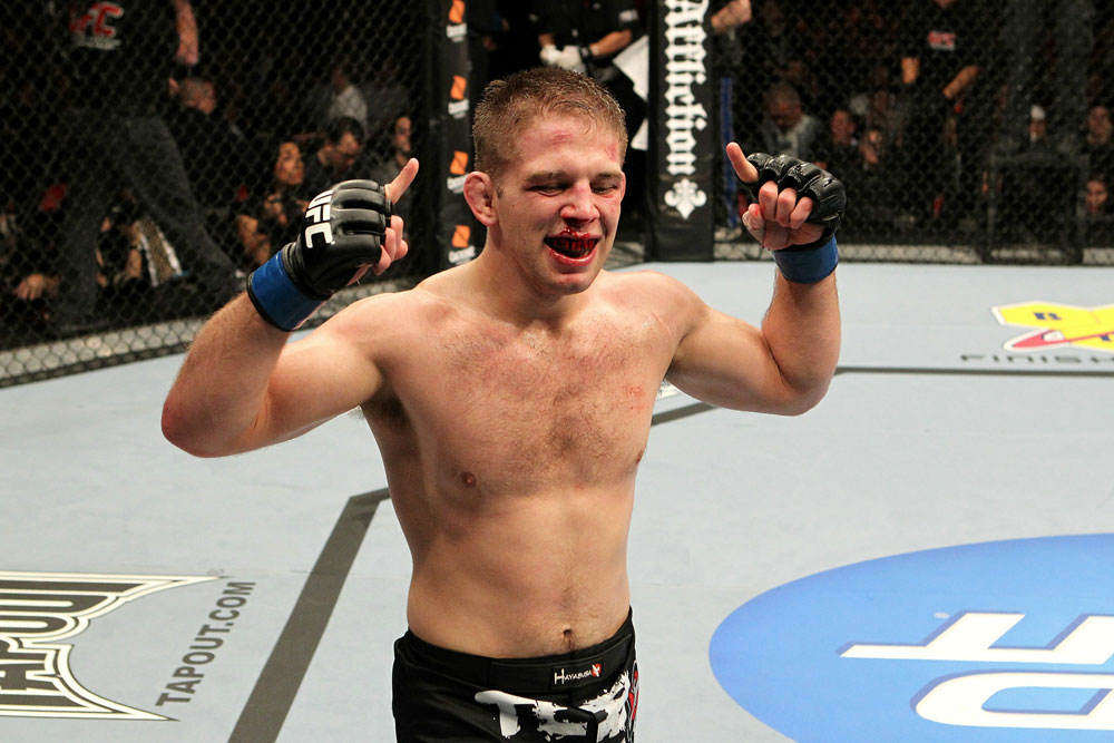 Nik Lentz celebrates his win over Tyson Griffin during UFC123.