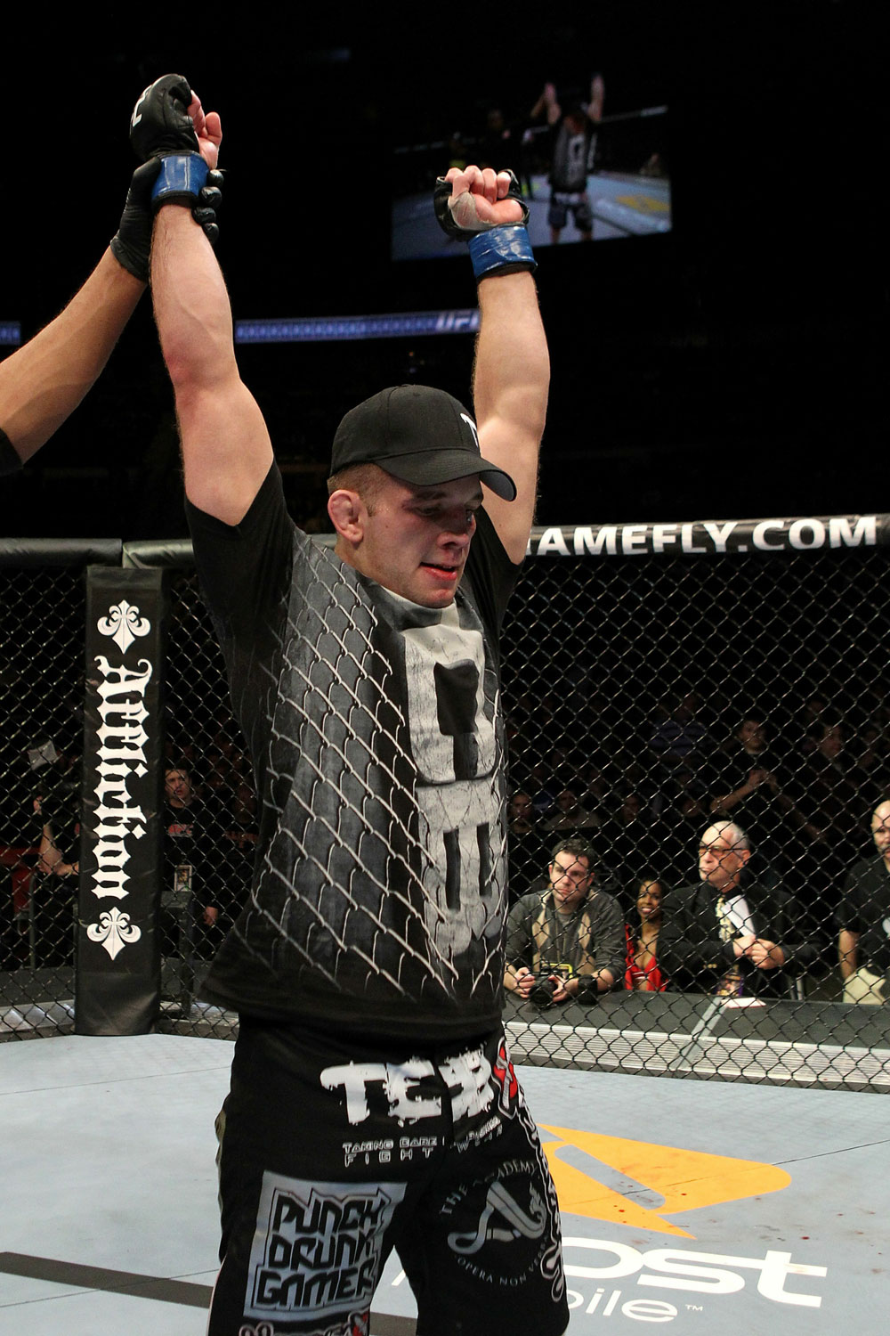 Nik Lentz celebrates after winning UFC 123 over Tyson Griffin.