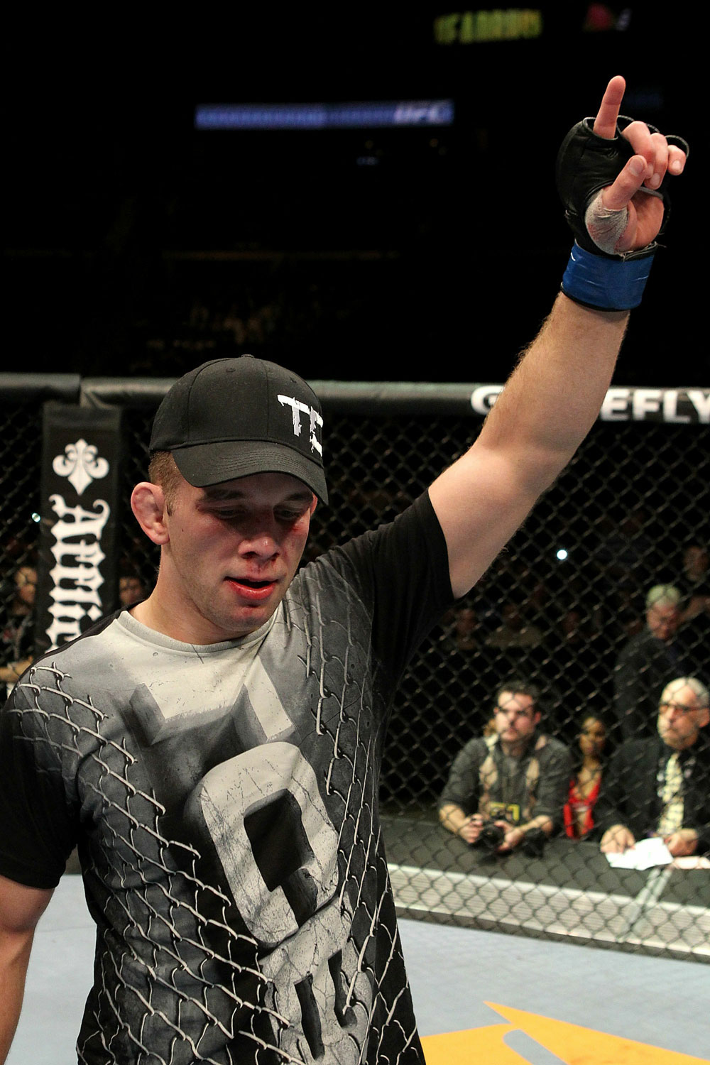 Nik Lentz celebrates after winning his fight over Tyson Griffin at UFC 123.