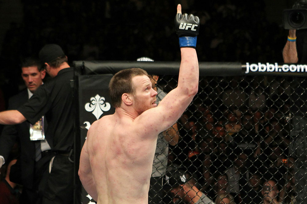 UFC123: Dennis Hallman celebrates after he won his fight by TKO against Karo Parisyan.