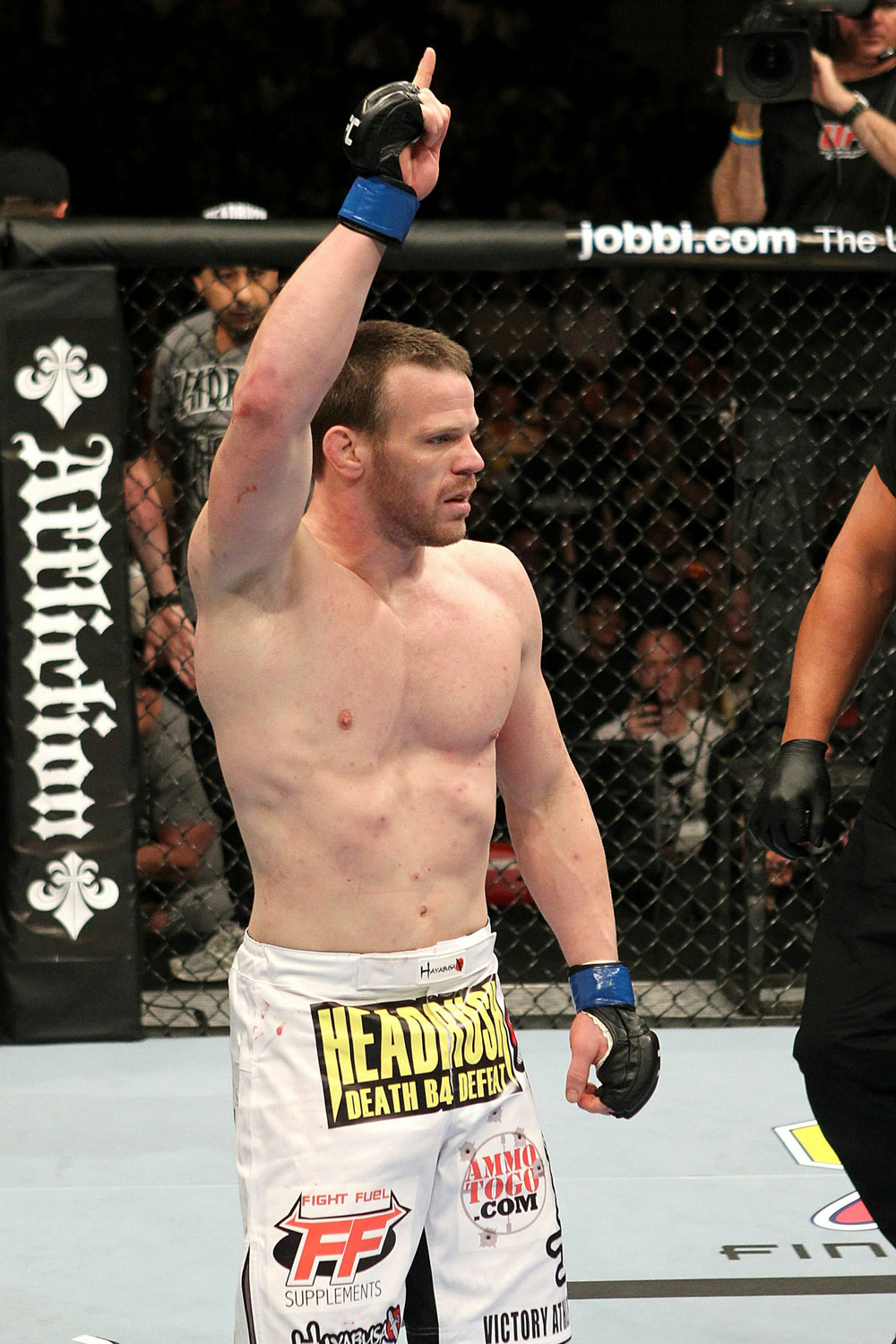 UFC123: Dennis Hallman celebrates after he won his fight by TKO against Karo Parisyan.